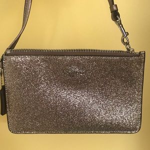 New in box Coach glitter wristlet